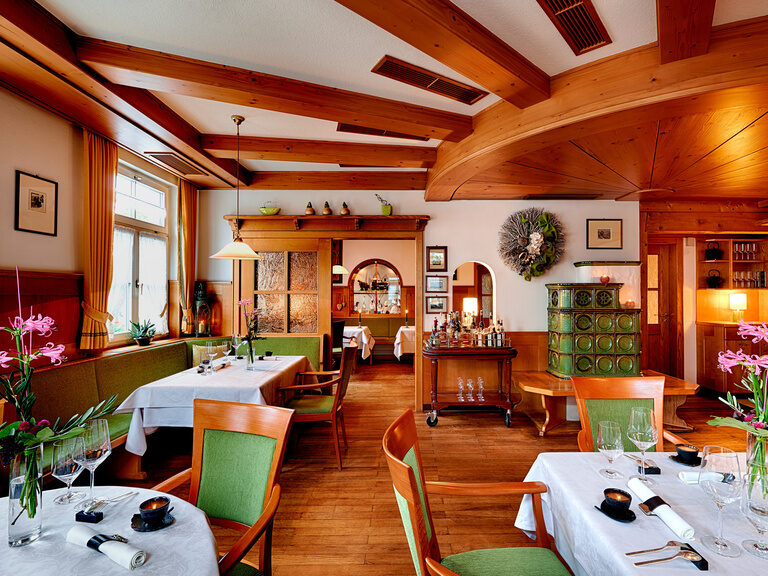 Tables set in the traditional ambience of the Berlins Krone gourmet restaurant.
