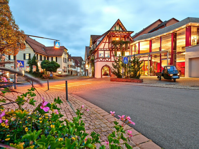 The illuminated town center of Zavelstein in the evening